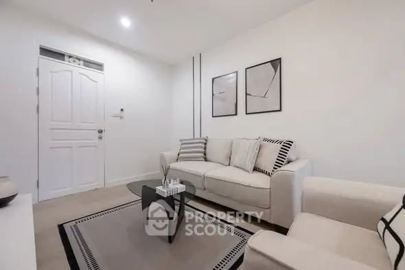 Modern living room with stylish decor and cozy seating area