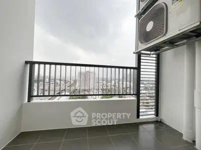 Modern balcony with city view and air conditioning unit, perfect for urban living.