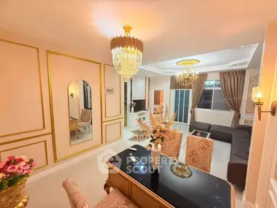 Luxurious living room with elegant decor and chandelier lighting