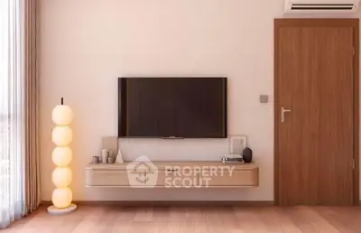 Modern living room with wall-mounted TV and stylish floor lamp