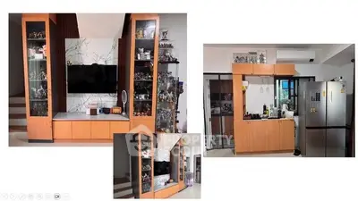 Modern living room with built-in TV unit and adjacent kitchen area