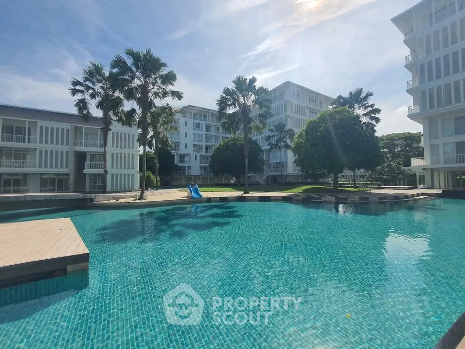 Luxurious residential complex with stunning pool and modern architecture