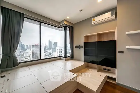 Modern living room with city view and built-in storage solutions
