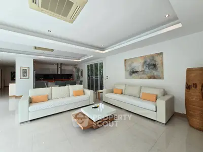 Spacious modern living room with elegant sofas and stylish decor