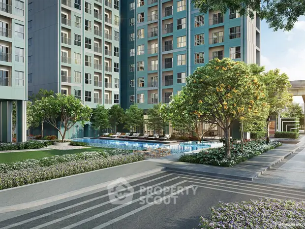 Modern residential building with lush garden and inviting pool area