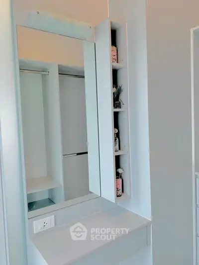 Modern bathroom vanity with sleek storage and mirror