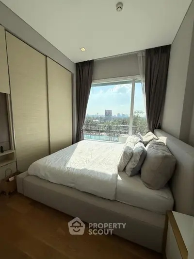 Luxurious bedroom with stunning city view and elegant decor