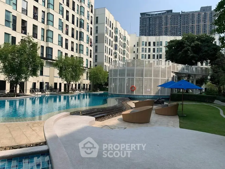 Luxurious apartment complex with pool and modern architecture