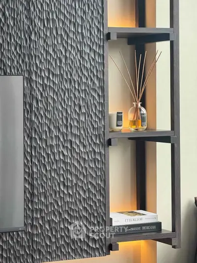 Modern interior design with textured wall panel and stylish shelving