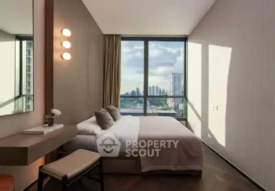 Luxurious bedroom with stunning city view and modern decor