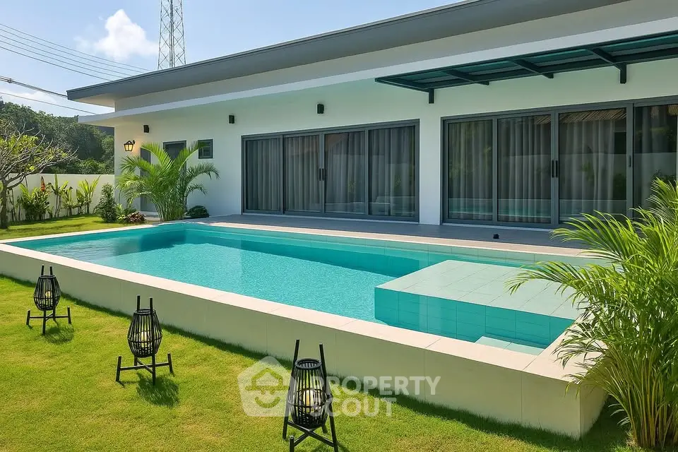 Luxurious modern home with private pool and lush garden