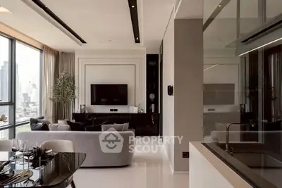 Luxurious modern living room with city view, elegant decor, and sleek furniture in high-rise apartment.