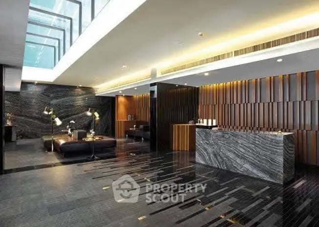 Luxurious modern lobby with sleek design and ambient lighting, perfect for upscale living.