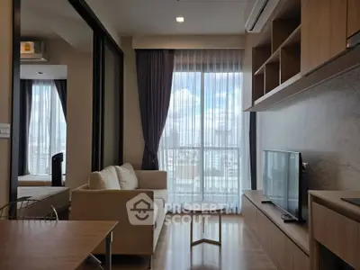 Modern living room with large window and cozy sofa in stylish apartment