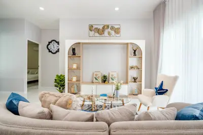 Elegant living room with modern decor and cozy seating area