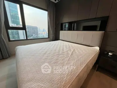 Modern bedroom with city view and stylish decor