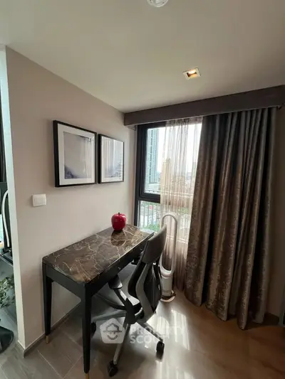 Modern study nook with marble desk and city view, perfect for productivity.