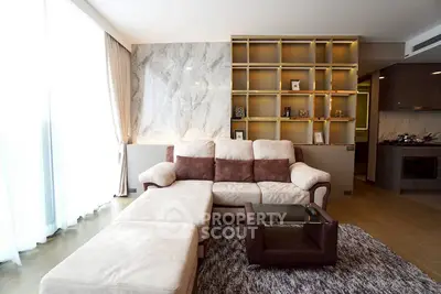 Luxurious modern living room with elegant marble wall and stylish shelving