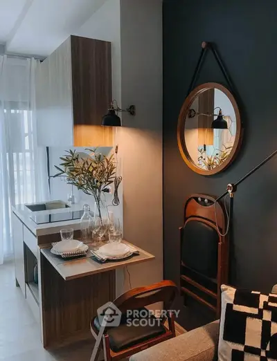 Chic modern kitchen with compact dining area and stylish decor