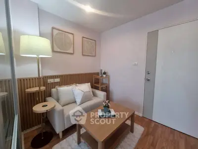 Cozy living room with modern decor and soft lighting, perfect for relaxation.