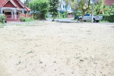 Spacious vacant land plot in a residential neighborhood, ideal for building a dream home.
