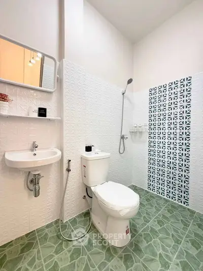 Modern bathroom with stylish tiles and sleek fixtures in a contemporary home.