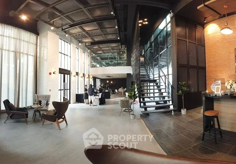 Luxurious modern lobby with high ceilings and stylish decor