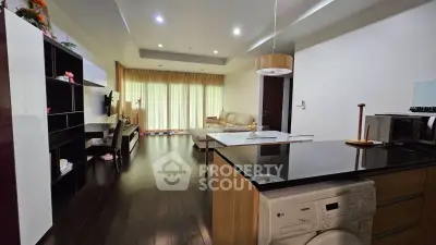 Spacious modern living room with open kitchen and stylish decor