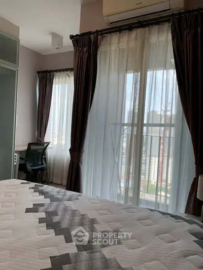 Modern bedroom with city view and stylish decor