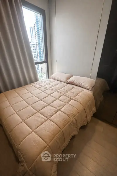 Cozy bedroom with city view and modern decor