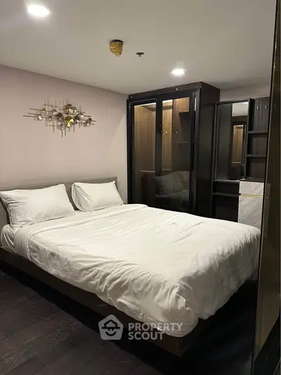 Modern bedroom with stylish decor and spacious wardrobe