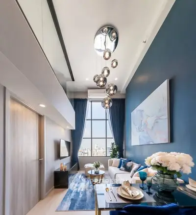 Luxurious modern living room with high ceiling and elegant decor, featuring a stunning city view.