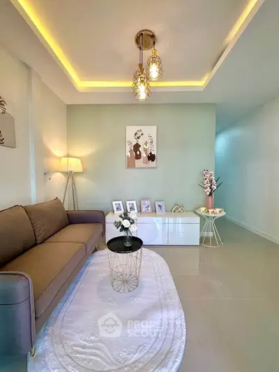 Elegant living room with modern decor and stylish lighting