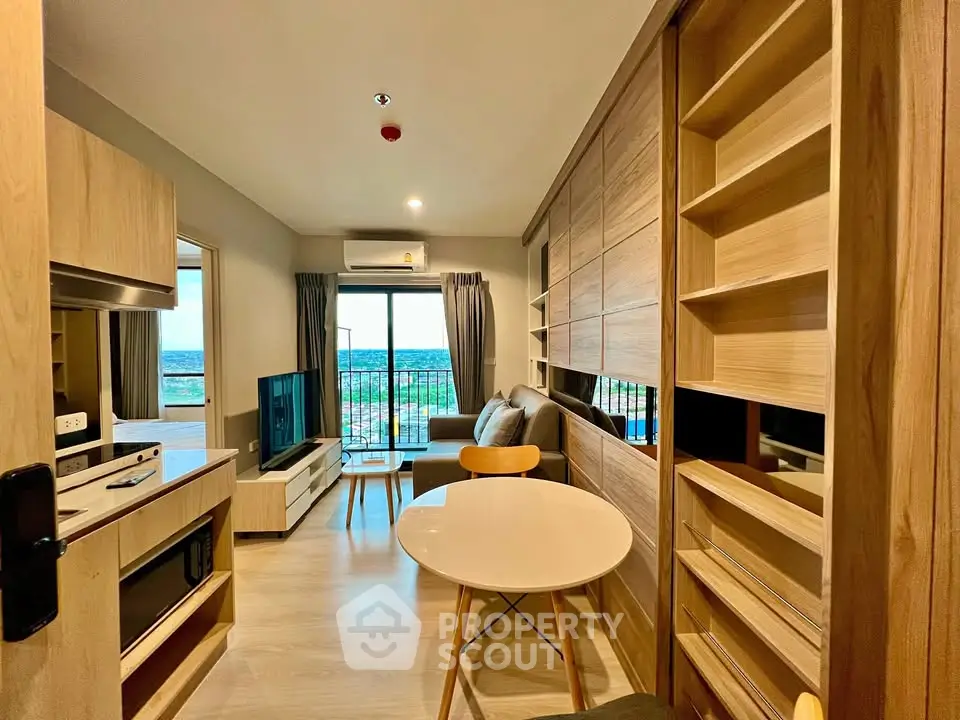 Modern living room with balcony view and stylish wooden furniture