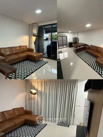 Spacious living room with modern leather sofa and stylish decor