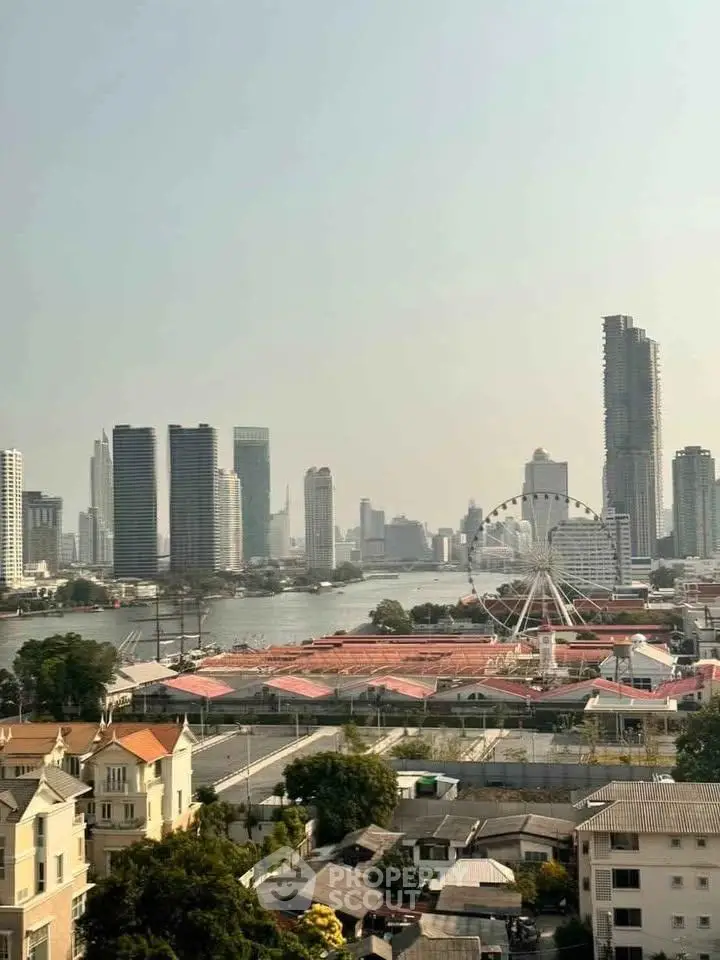 Stunning cityscape view with river and skyline, perfect for urban living enthusiasts.