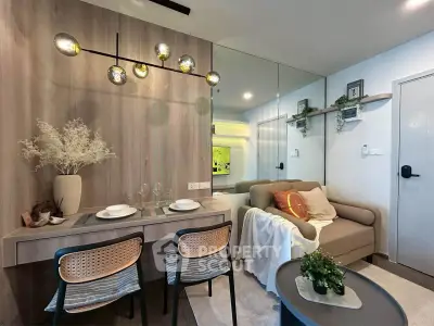 Modern living room with stylish decor and cozy seating area in a contemporary apartment.