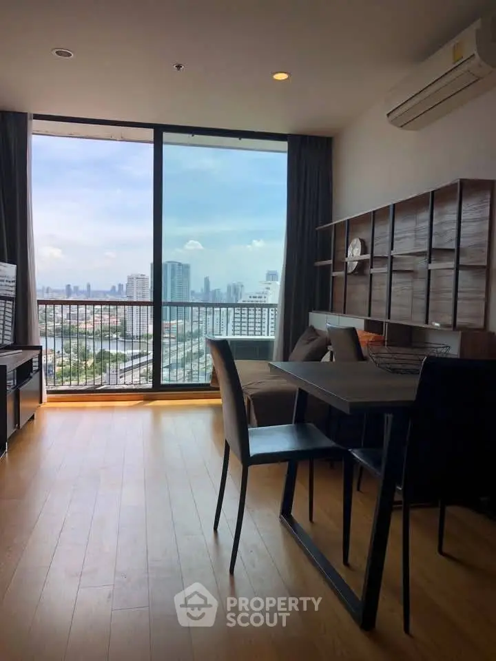 Modern living room with stunning city view and stylish furniture