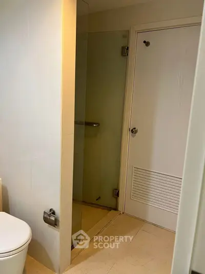 Modern bathroom with glass shower and sleek design