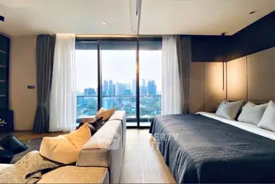 Luxurious bedroom with stunning city view and elegant decor