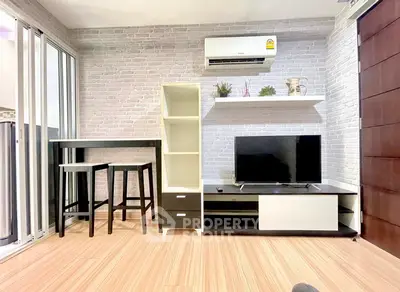 Modern living room with stylish furniture and air conditioning in a cozy apartment.
