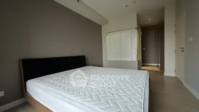 Spacious bedroom with modern design and natural light
