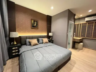 Luxurious modern bedroom with elegant decor and ambient lighting