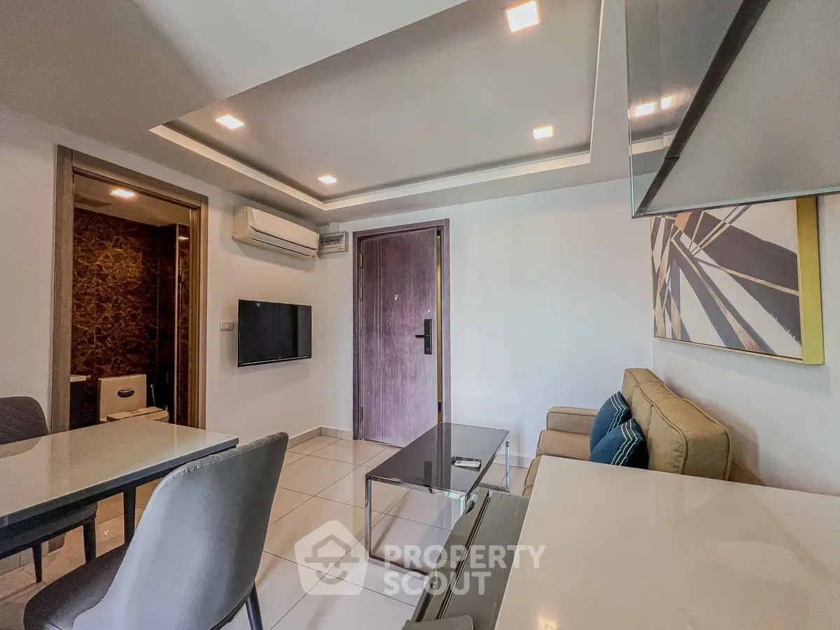 Modern living room with sleek furniture and stylish lighting