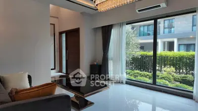 Luxurious living room with garden view and elegant decor
