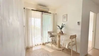 Cozy dining nook with natural light and minimalist decor