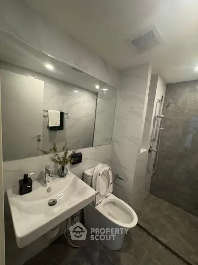 Modern bathroom with sleek design and spacious shower area