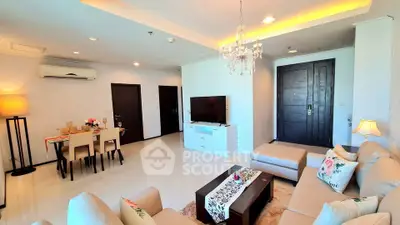 Spacious and elegant living room with modern decor and cozy seating area