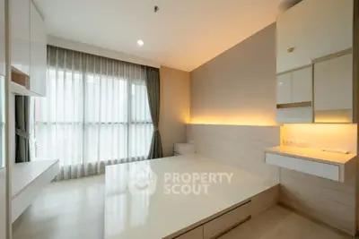Modern minimalist bedroom with large window and built-in storage