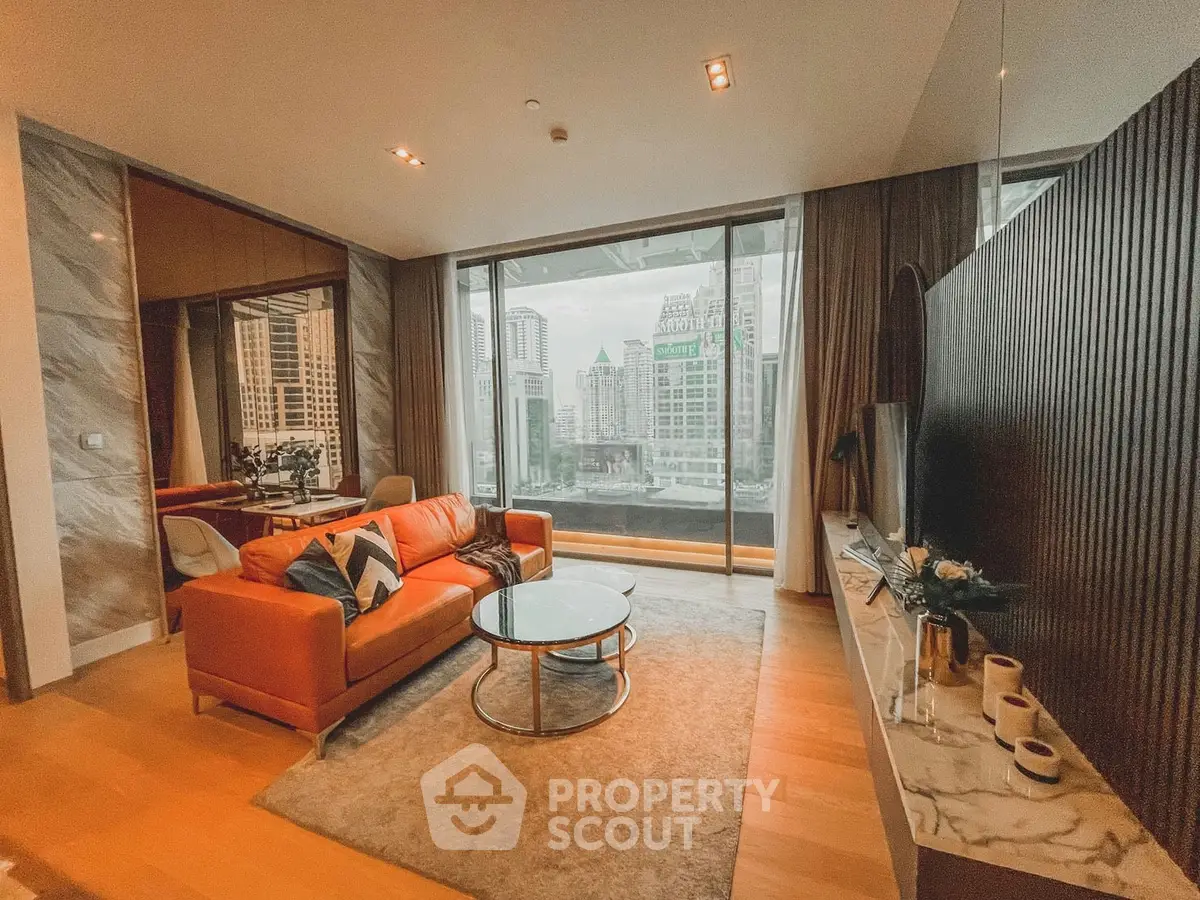 Luxurious living room with city view, modern furniture, and elegant decor in high-rise apartment.